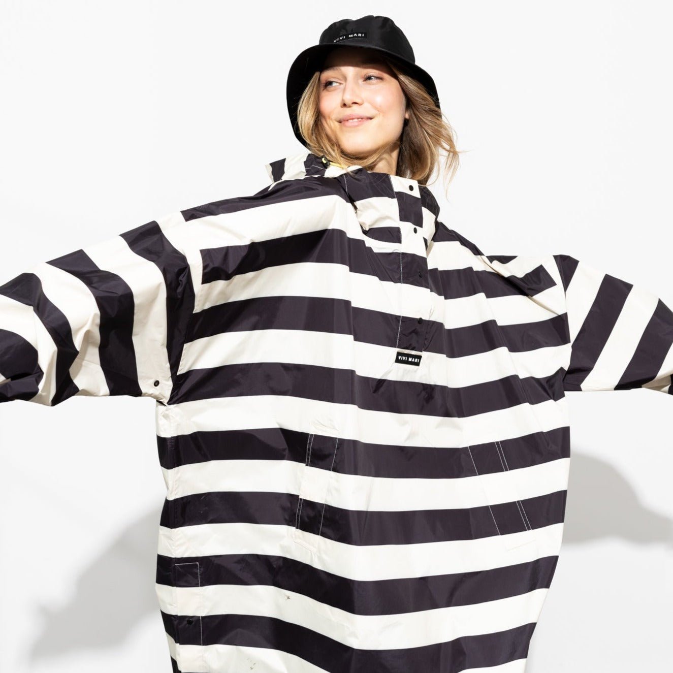 Black and clearance white striped raincoat